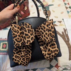 Elegant Black Satchel with Leopard Bow